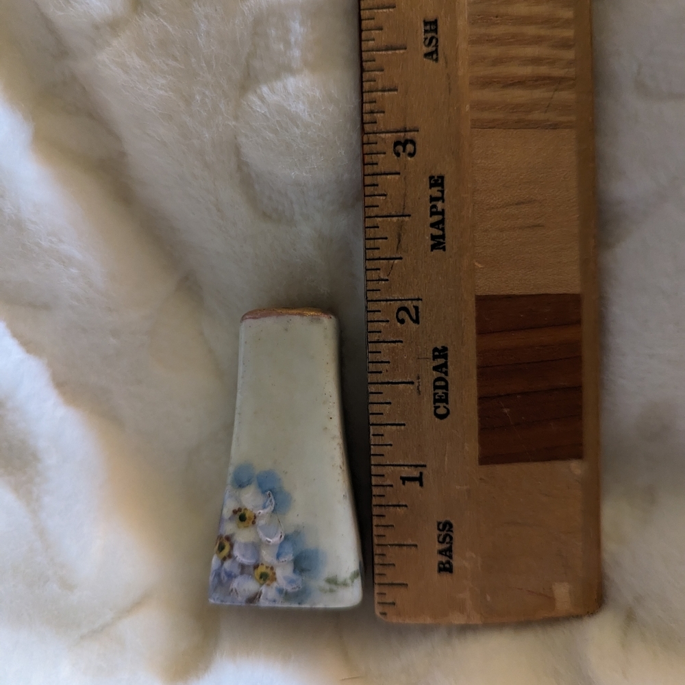 Vintage 1920s spice shaker.